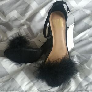Black furry shoes